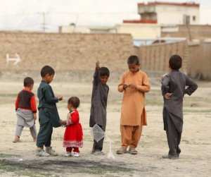 Children on an empty street in Afghanistan